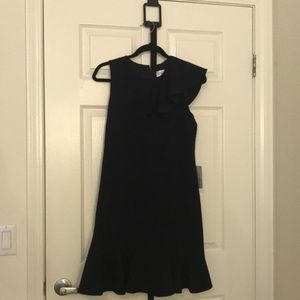 Navy blue ruffle shouldered dress.